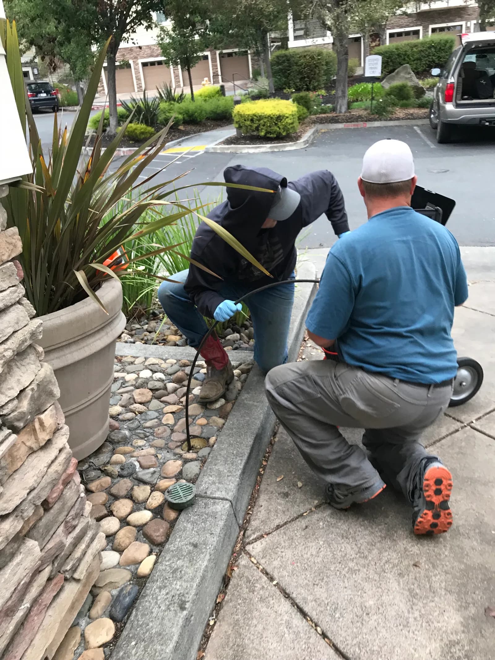 Sewer line investigation with camera equipment at an access point