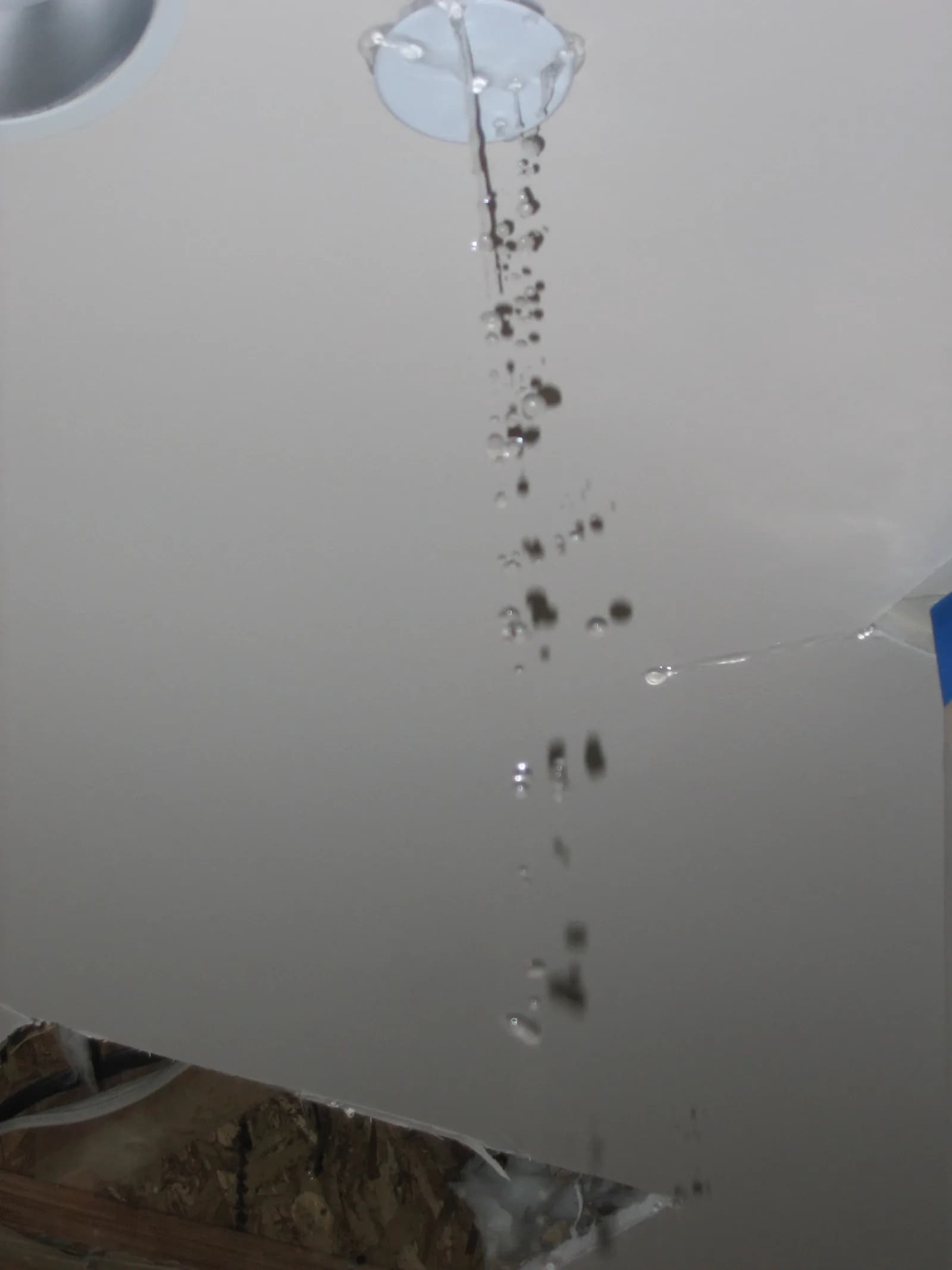 Water staining and damage documented as evidence of water intrusion